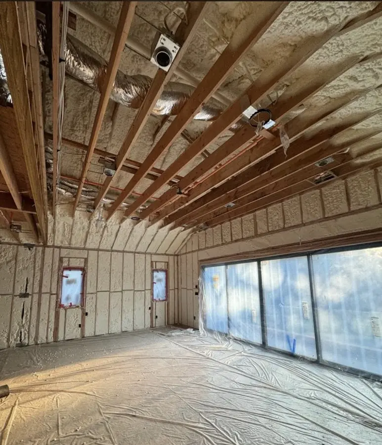Interior walls and ceiling insulated with spray foam during new construction in Drexel Heights